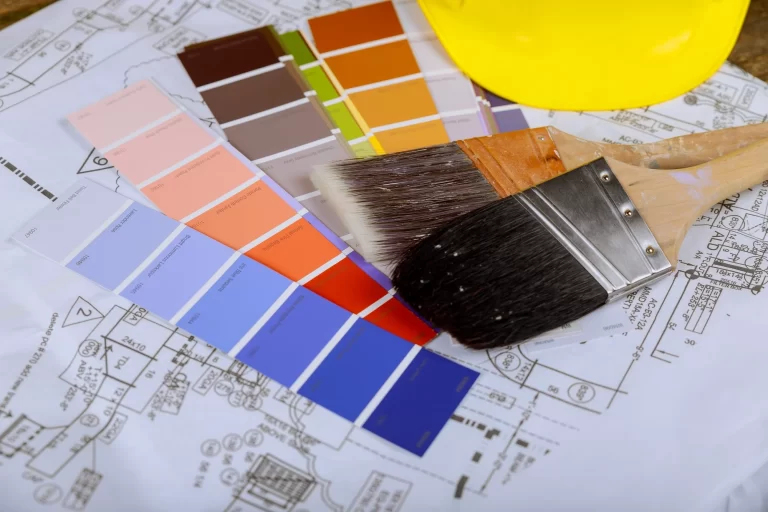 Painting project supplies color chart sample swatches, paint brush